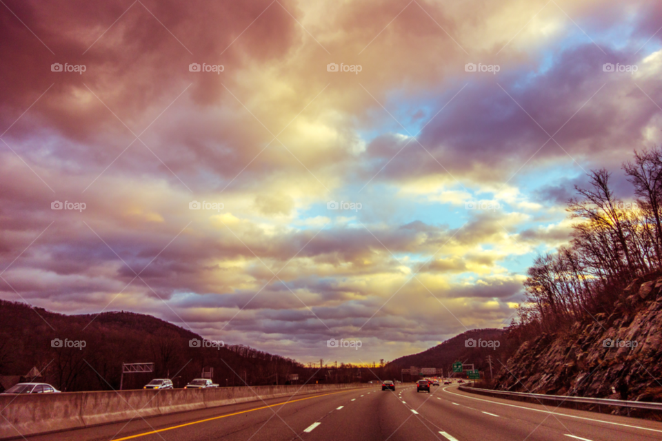sunset clouds road thruway 87 by delvec