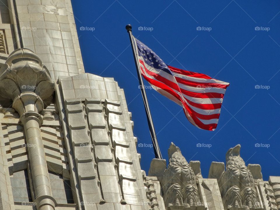 America Flag Flying Over Art Deco Building
