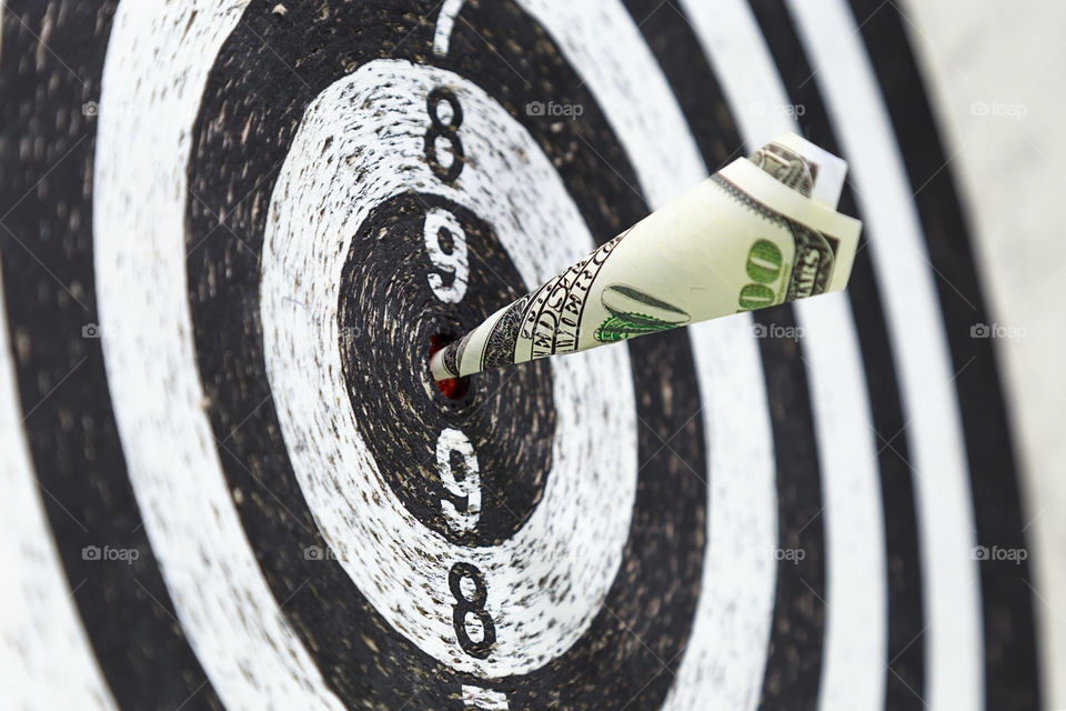 dollar in dartboard