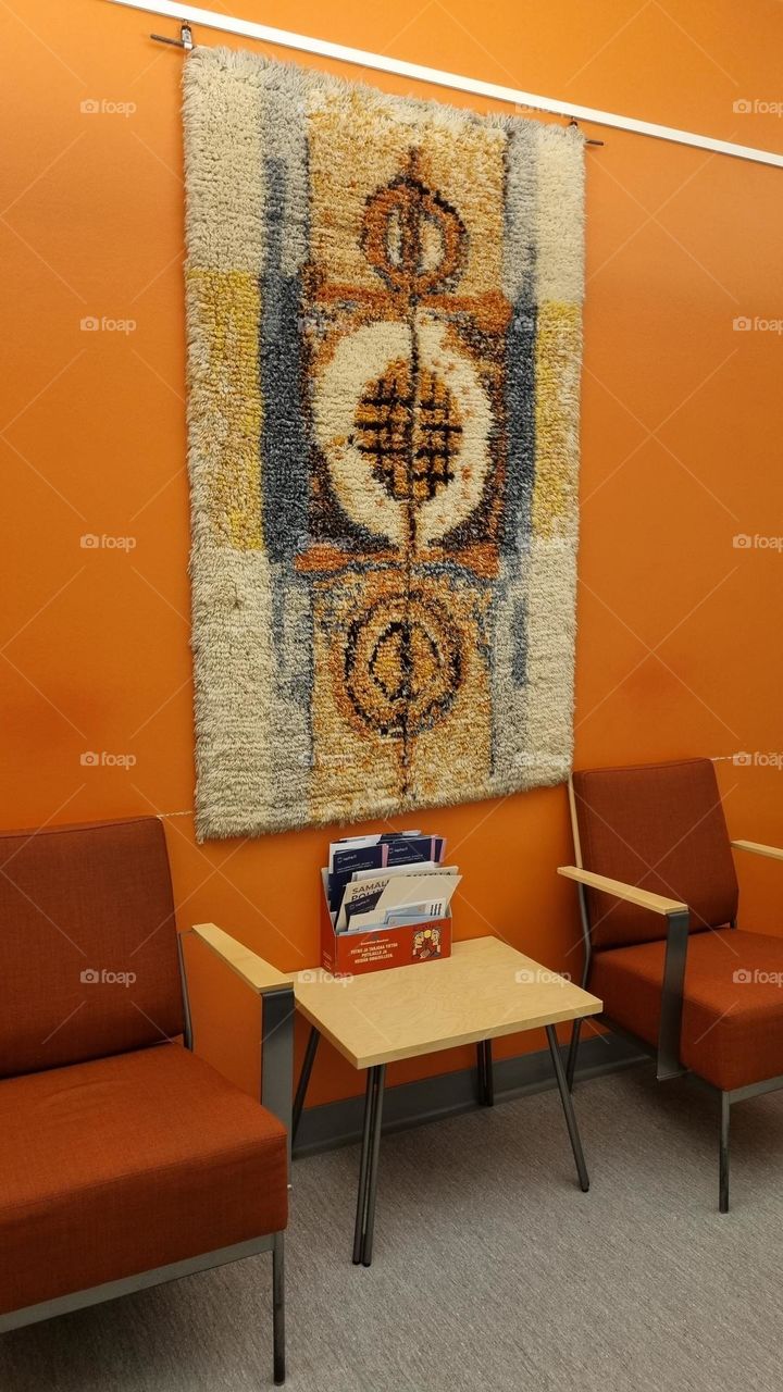 The waiting areas of the health center have a colorful and cozy interior