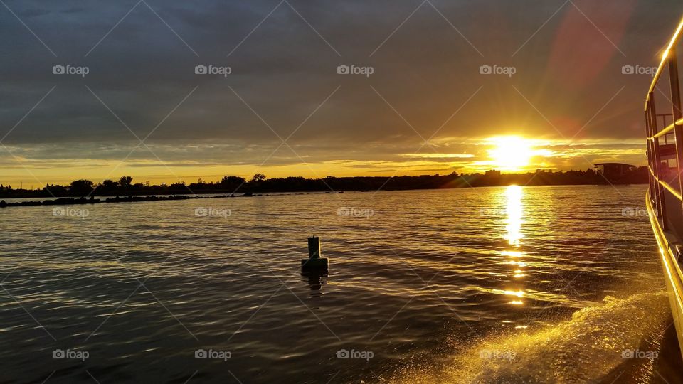 Sunset on side of boat