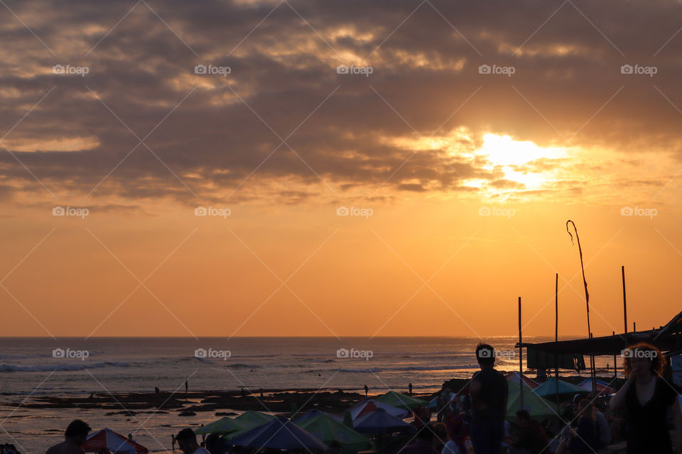 Sunset and the people