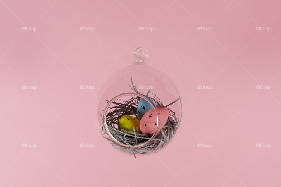 Easter eggs in floatin glass nest