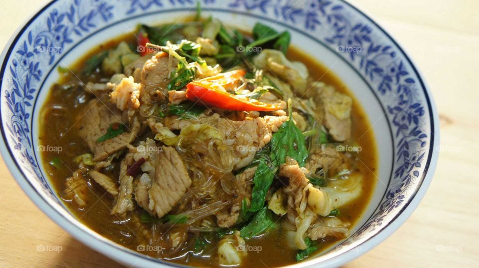 this Thai food  was made from pork and spicy sauce called " Apirom sauce".
Apirom sauce is the new brand of Thai spicy sauce.  It is the taste of North eastern thailand food. Anyone can make this extremely delicious dish just using Apirom sauce.