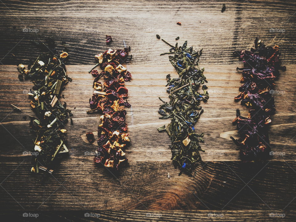 Teas. Various teas on a wooden background 