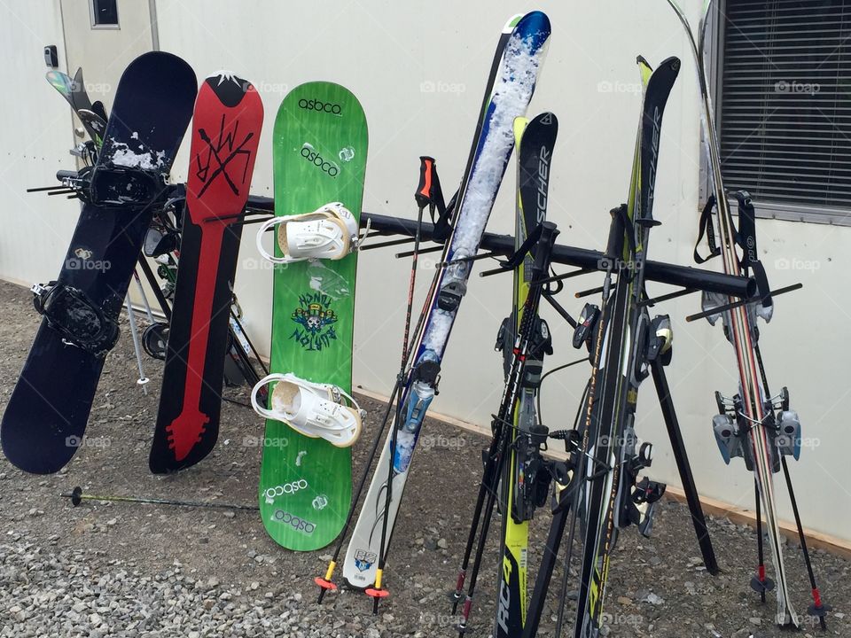 Snowboards and skis