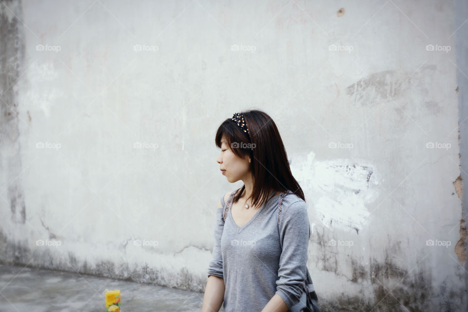 Travel, @Quanzhou, with Monica. Took lots of pics for Monica. A grey wall is as the background, some different feeling were crashing my mind...