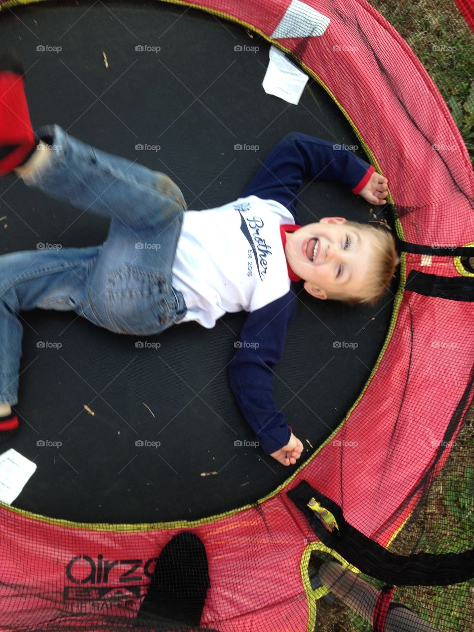 Boy and a trampoline 
