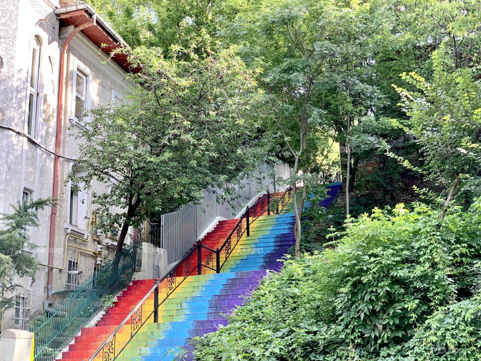 Multicolored rainbow stairs in Bucharest city - LGBTQIA colors flag 