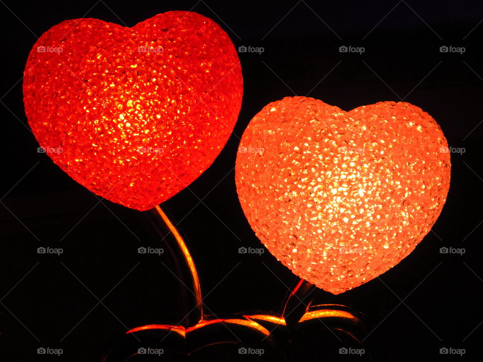 Heart shape lamp against dark background