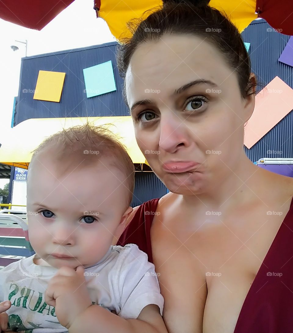 Baby is not thrilled at the water park.