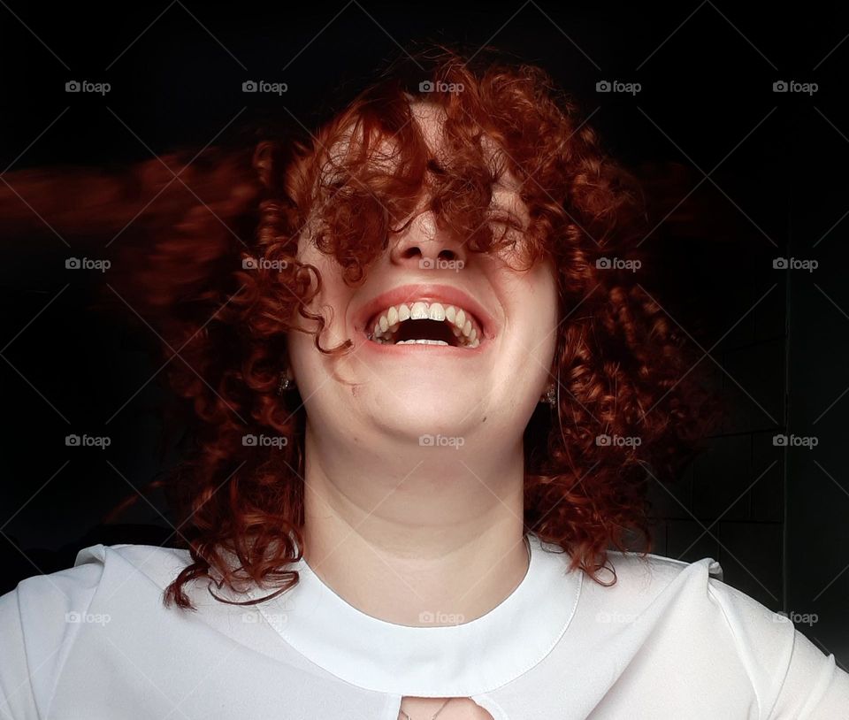 Photo of a girl who is happy with her hair