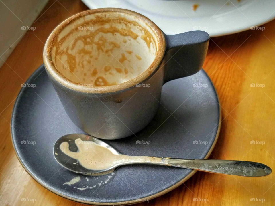 Empty Cup and Saucer