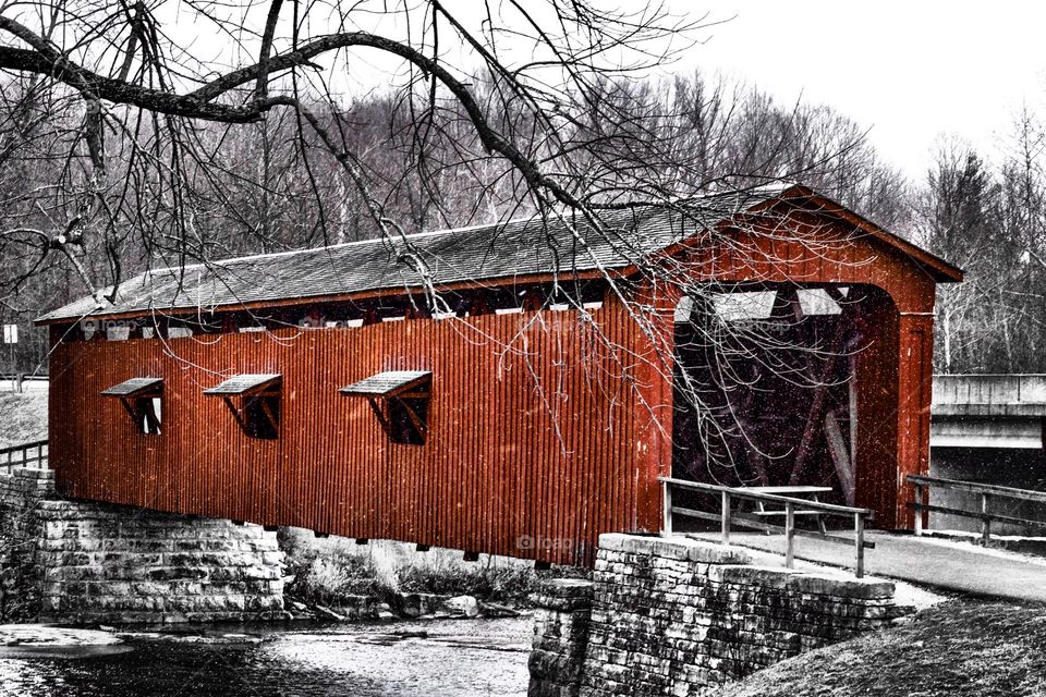Red snowy covered bridge 