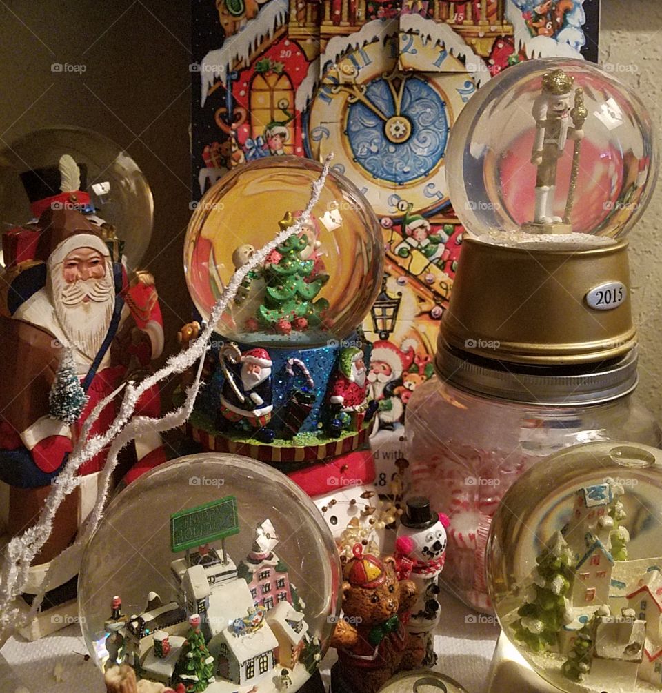 holiday snow globes and vintage santa