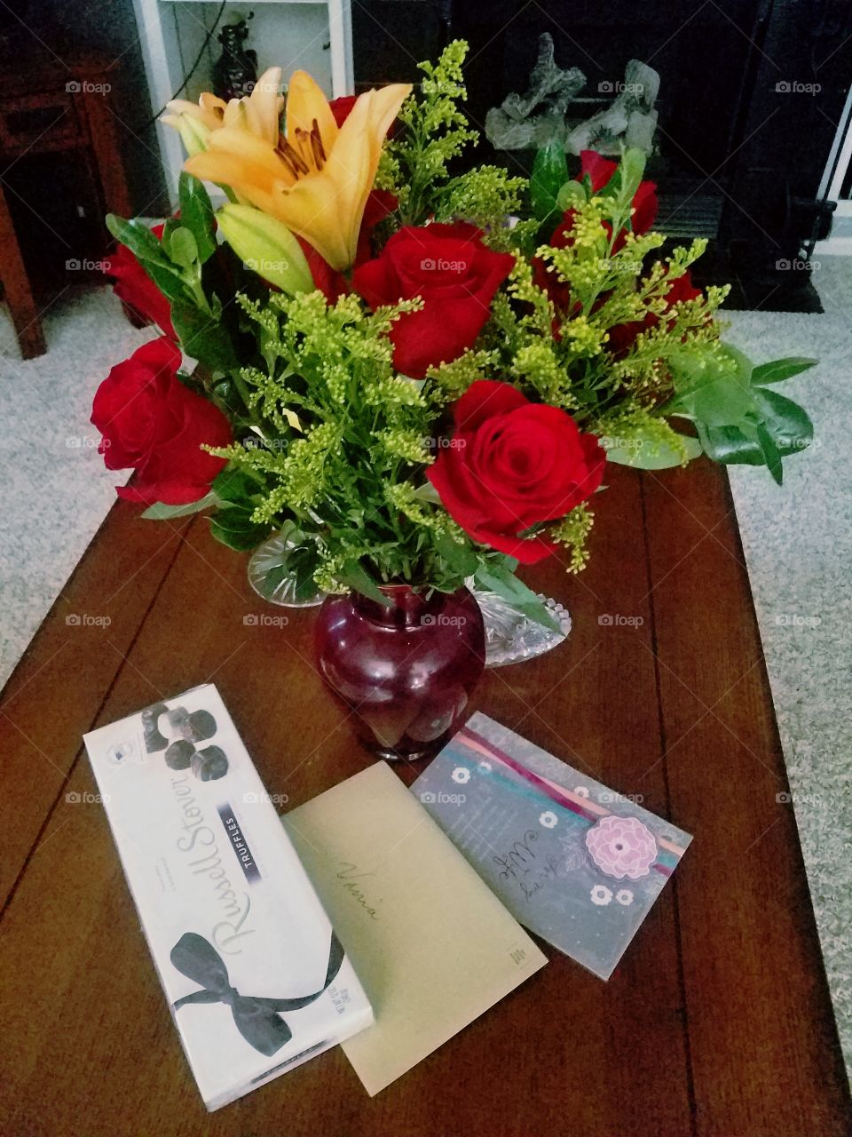 Truffles and flower vase on table