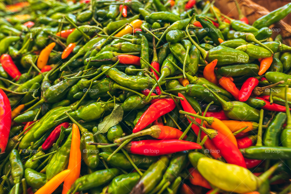 Green chili peppers. Food market. Bali island.
