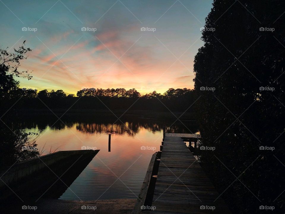 Sunset pier Still water