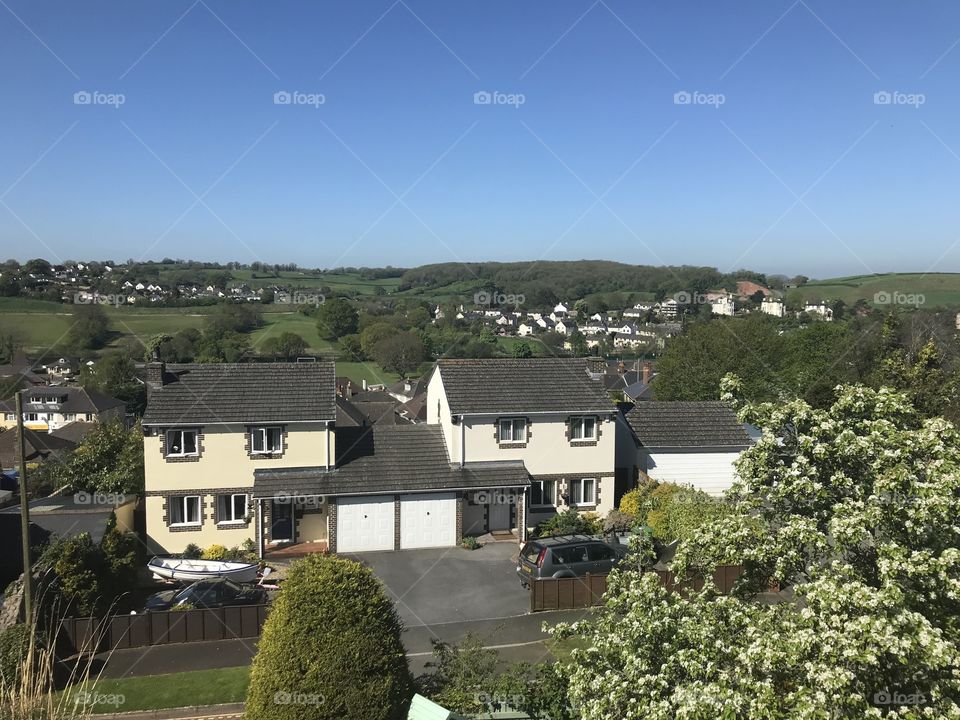 Devon Villages enjoying hot warm sunshine in springtime, something to be enjoyed while it lasts, this is England after all.