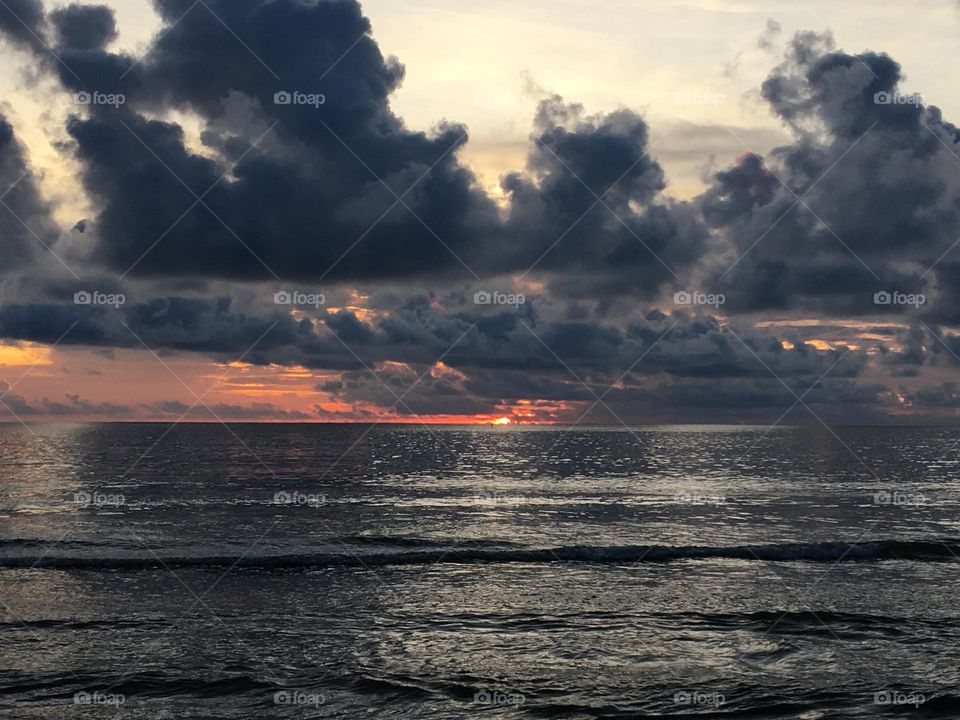 Black clouds on black sea 