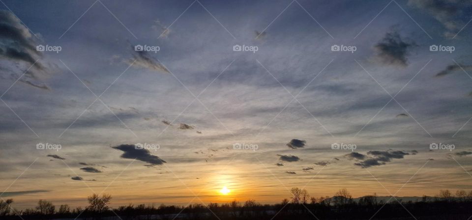 Majestic sunset scene with beautiful view of colored sky in the last moments of the day