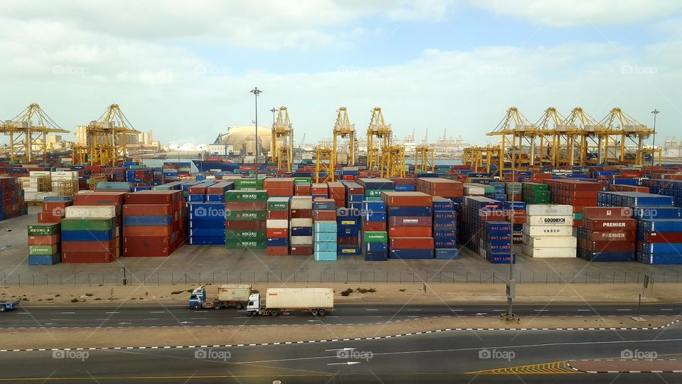 Containers and cranes at Jebel Ali port, Dubai, UAE