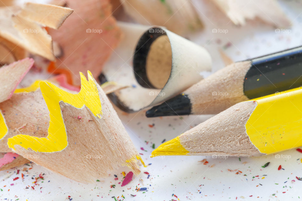 Close-up of two pencils and shaving