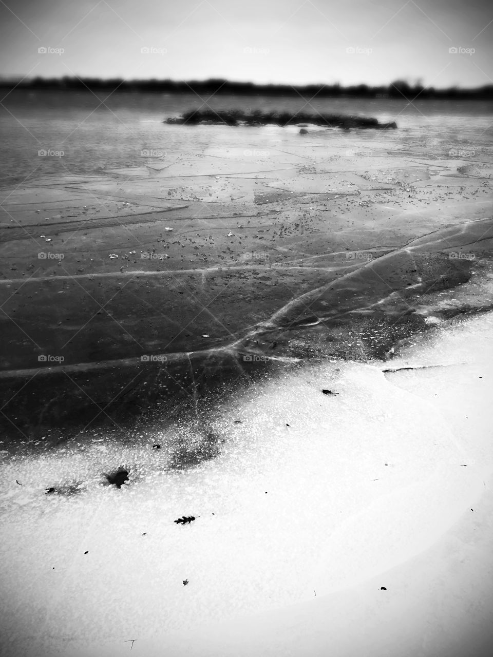 A vast river of ice. The contrast focusses on the fissures where strength was overcome but not broken. 