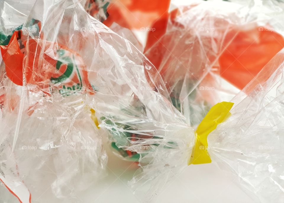 Plastic waste - A pile of SINGLE-USE PLASTICS grocery bags. Environmentalism & Plastic Awareness.