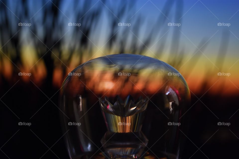 Light bulb at sunset