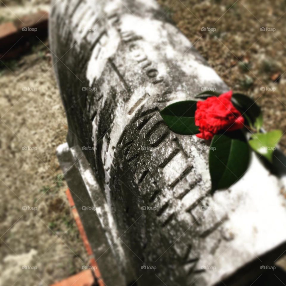 Old Grave of a mother who was loved dearly and passed away long ago.