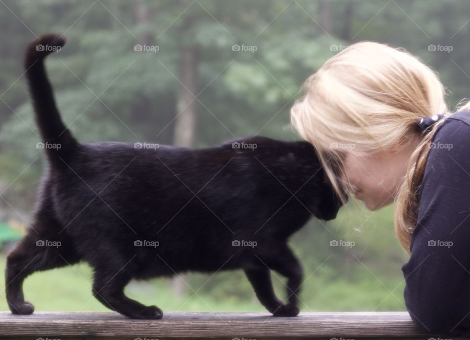 My Betsy showing affection outside on a foggy day.