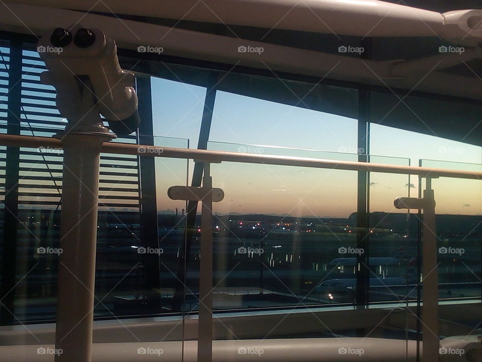 Heathrow Airport terminal 2 at sunset