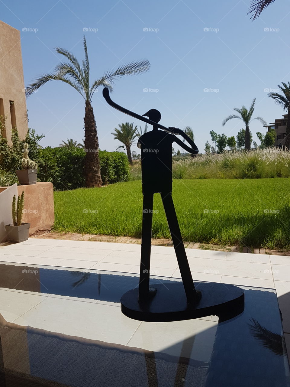 golf statue status garden terasse Palm golf sport