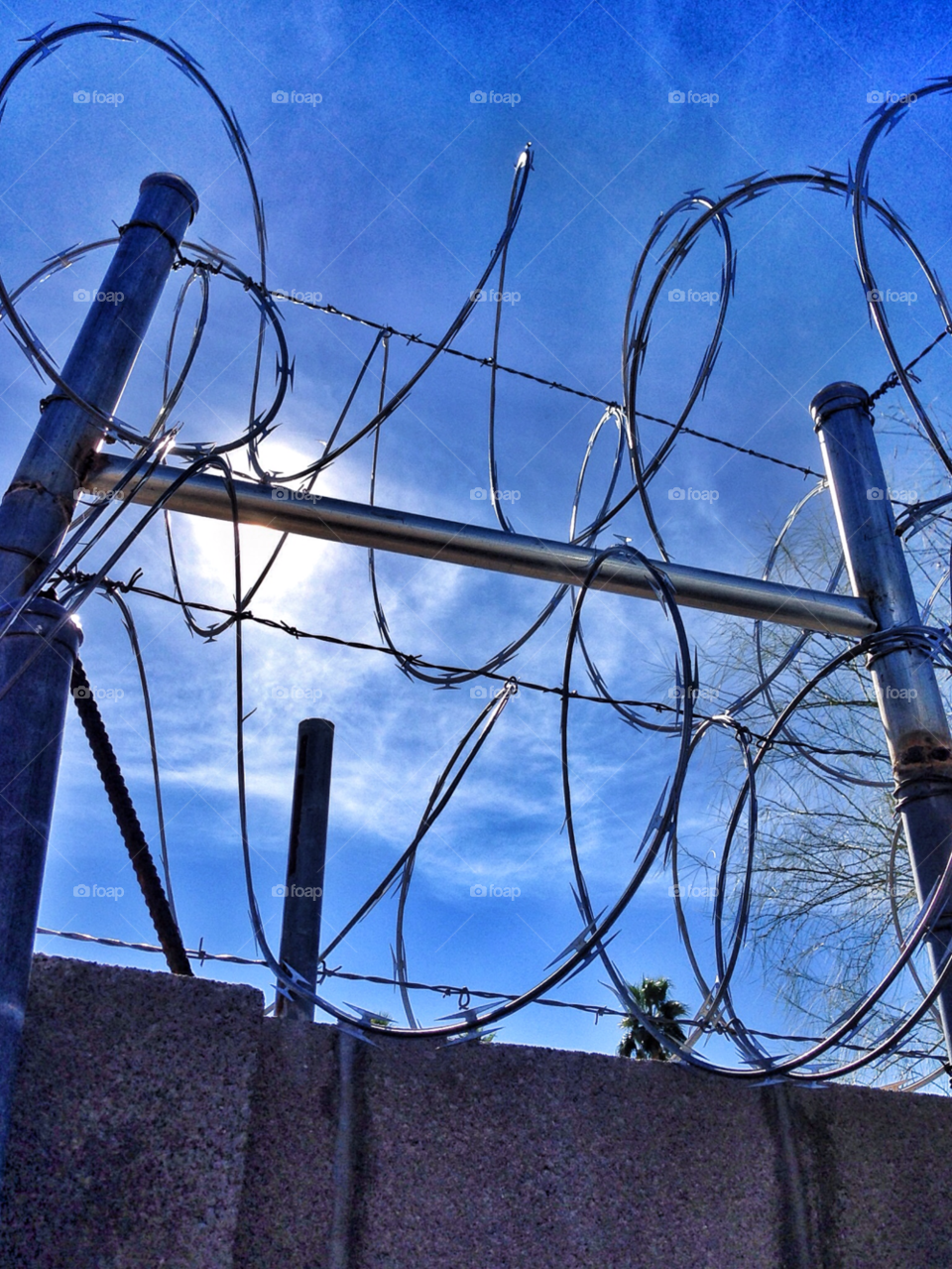 sky blue fence sun by stevehardley7