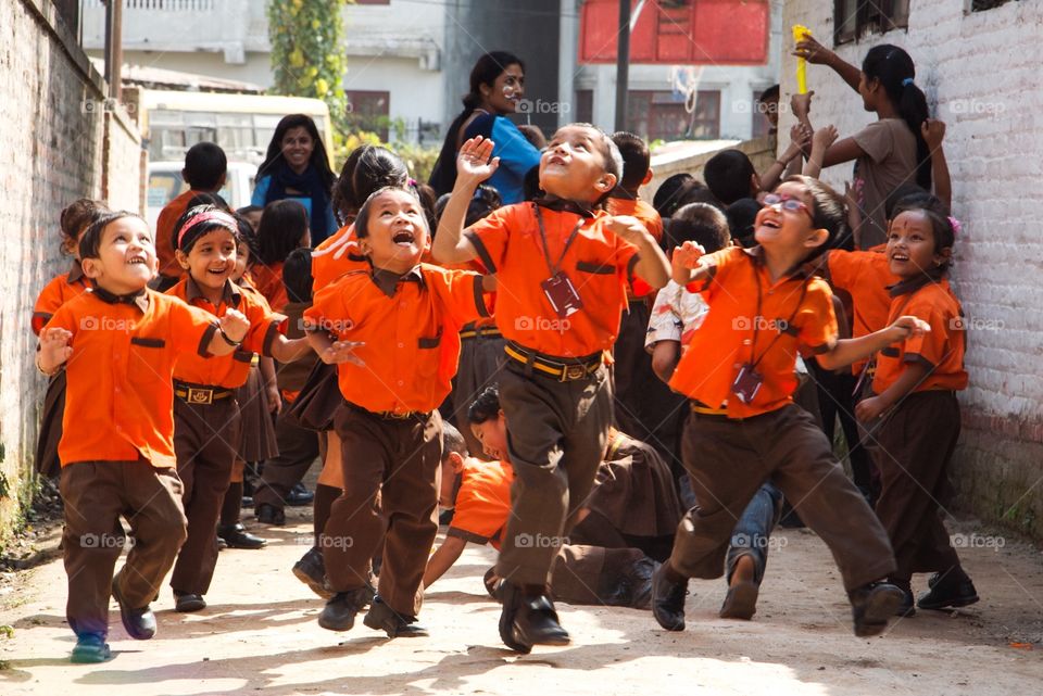 Happy children in school uniform