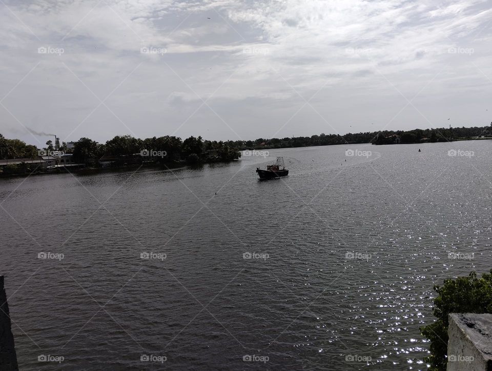 Lake and fishing boat.