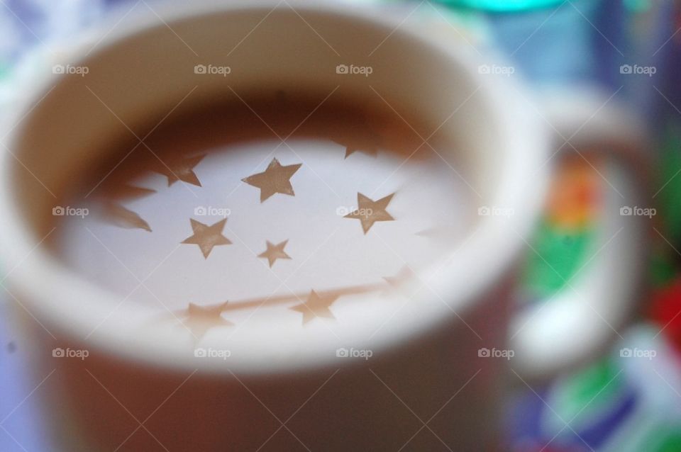 Coffee with reflection of stars
