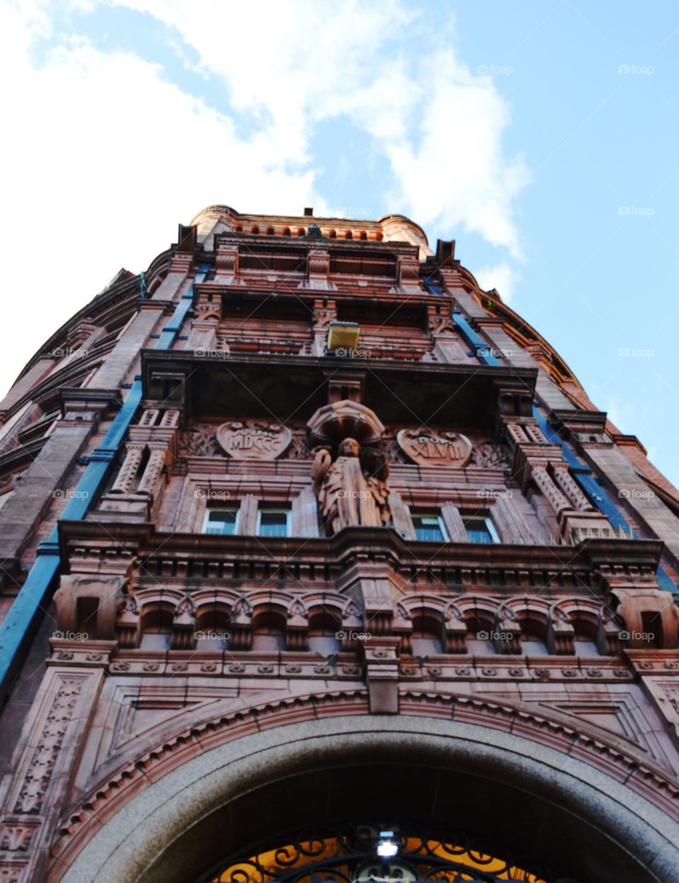 looking up. This is the English building in witch is lokated a
 Brazilian restaurant "Tropeiro"