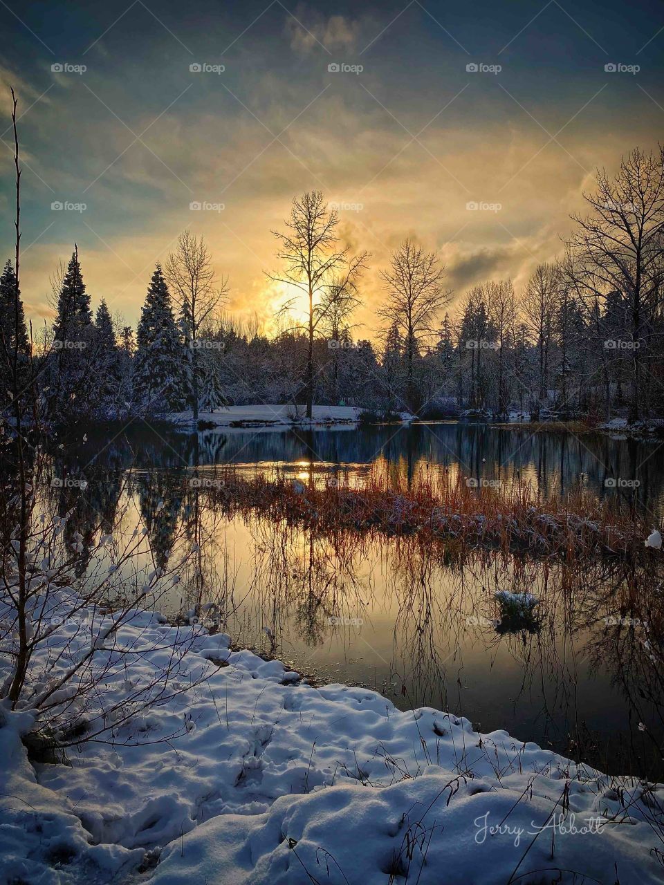 Winter Sunset reflection at Battle Point Park duck pond after recent and rare winter snow!