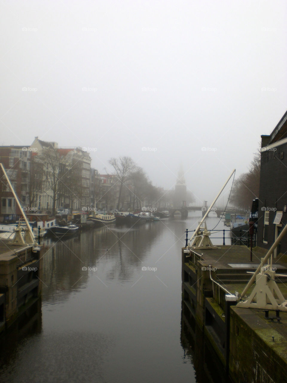 fog canals amsterdam houseboats by trvldeb07