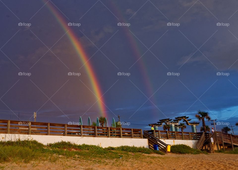 Double Rainbow at Sunrise. Went to the beach in Ormond Beach, Florida to get a photo of sunrise. Turned around and saw a double rainbow behind me. 