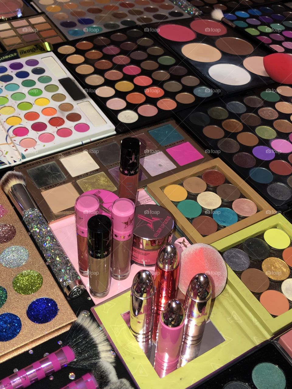 A close up of my larger image of makeup already posted in mission.  Some Jeffree Star liquid lips and bullet lipsticks & lip sugar scrubs, Beauty Killer palette, Shop Missa eyeshadow palettes, Bhcosmetics, Morphe & JunoCo microfiber beauty blender.