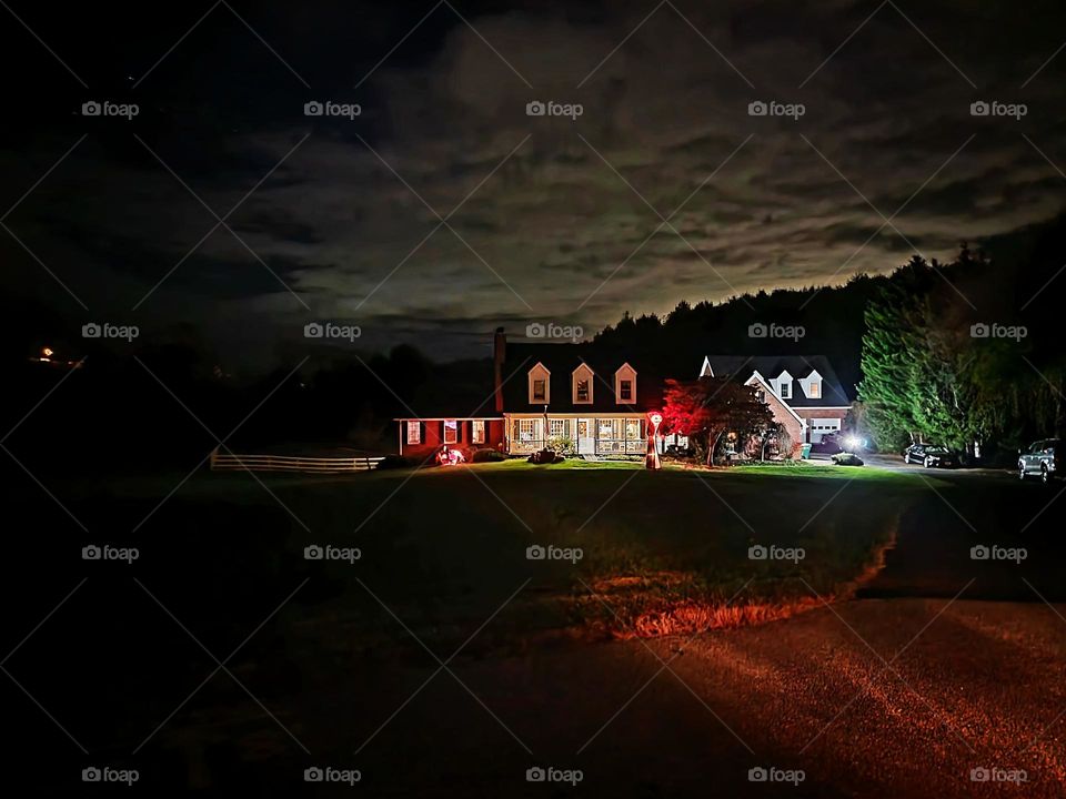 night photo of a house in autumn