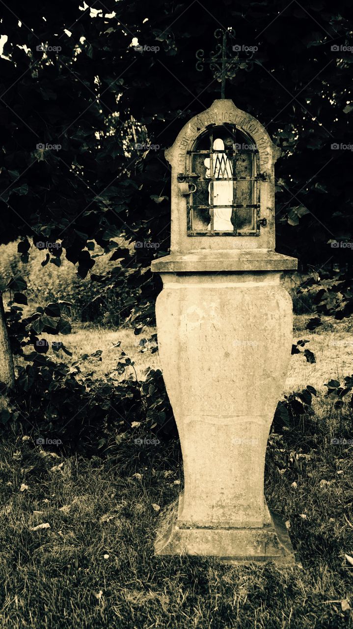 Old religion object outdoors in Belgium.