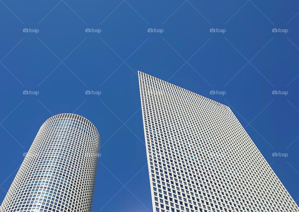 Skyscrapers 🏢 Blue sky 💙 Windows🏢