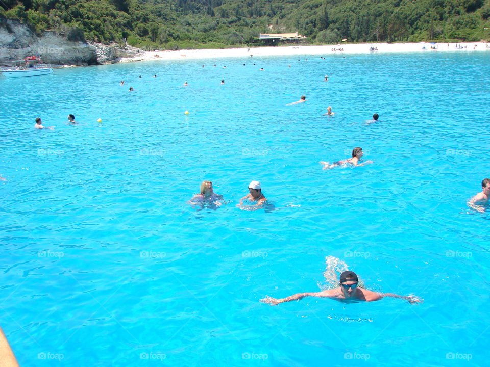 People enjoying in sea