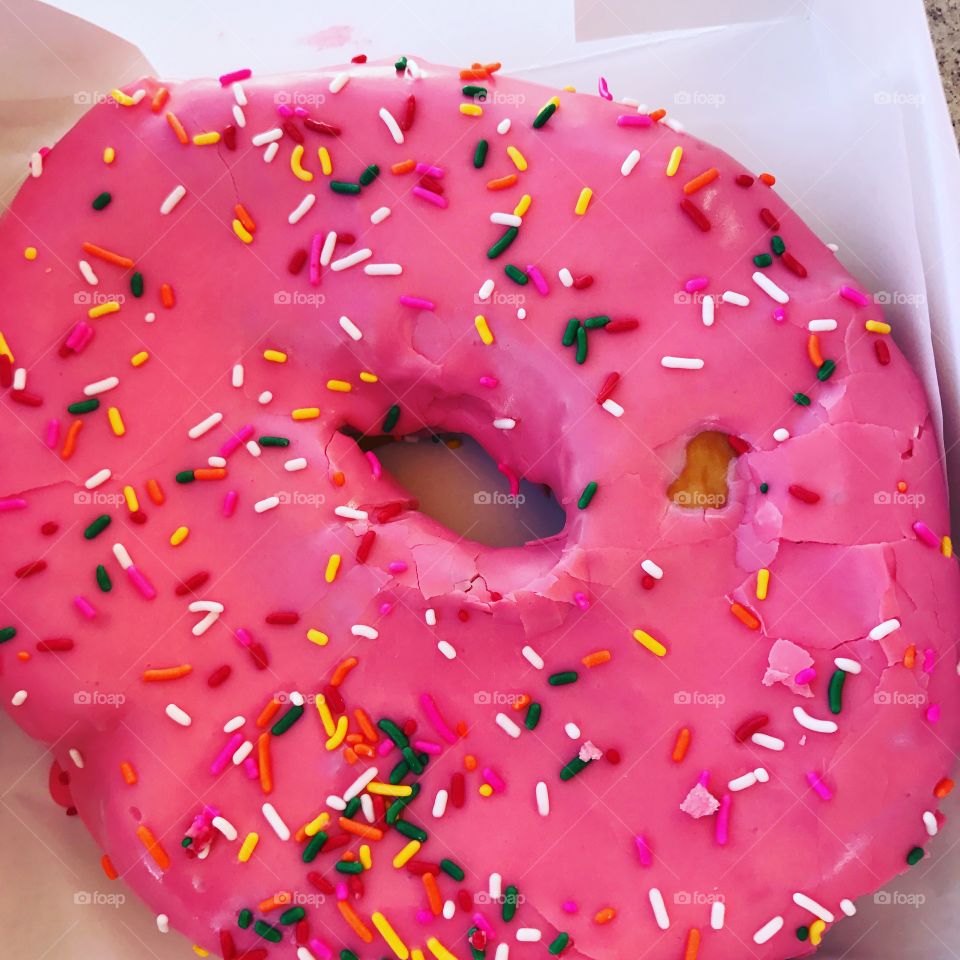 Giant pink donut! Break your diets and start craving this delicious monster of a donut! Treat yourself! 