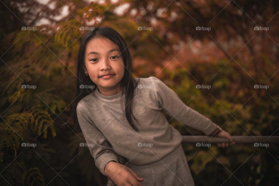 Portrait of a young girl in Fall season mood