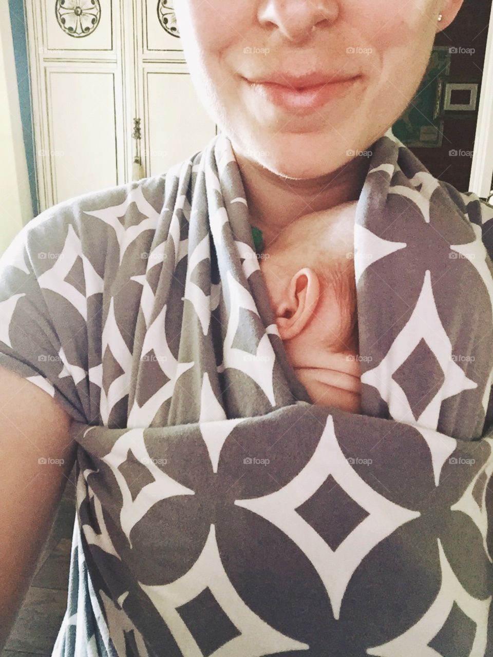 Infant in wrap carrier